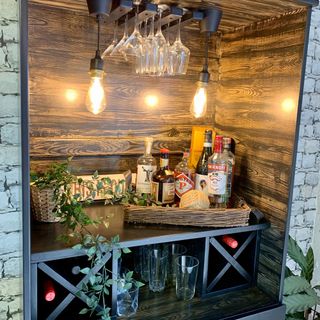 home bar with bottles and lights
