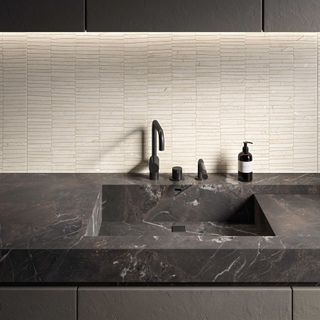 dark grey marble-effect countertop with kitchen sink