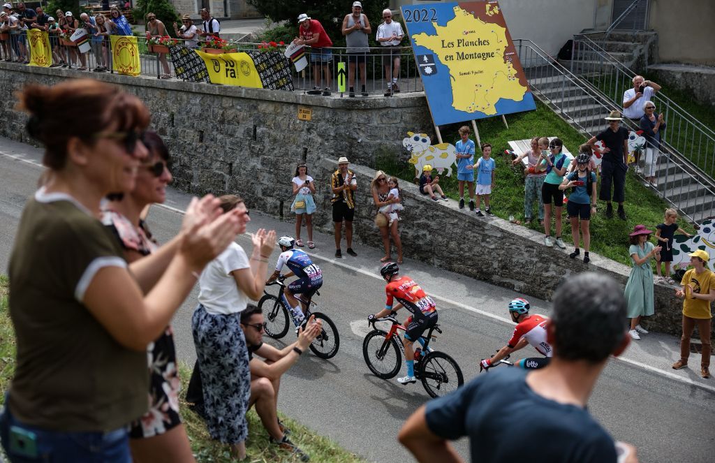 QuickStep Alpha Vinyl Teams Italian rider Mattia Cattaneo L Bahrain Victorious teams British rider Fred Wright C and Lotto Soudal teams Belgian rider Frederik Frison R cycle in a breakaway during the 8th stage of the 109th edition of the of the Tour de France cycling race 1863 km between Dole in eastern France and Lausanne in Switzerland on July 9 2022 Photo by Thomas SAMSON AFP Photo by THOMAS SAMSONAFP via Getty Images