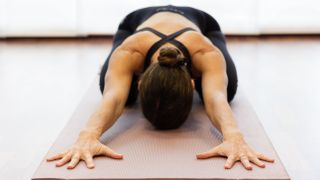 a photo of a woman doing yoga