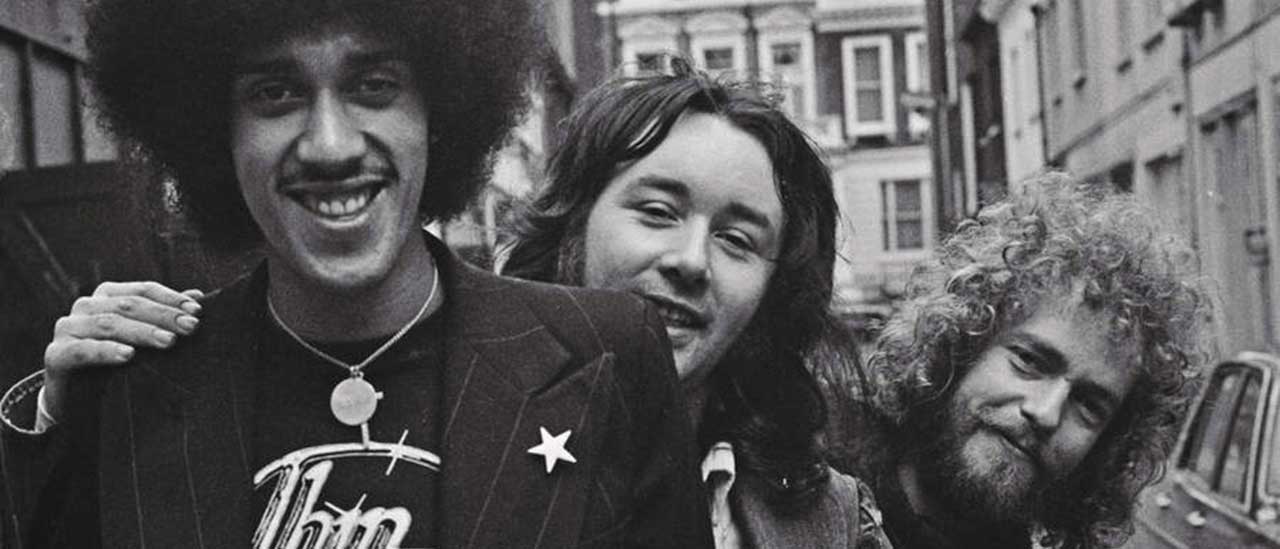 Thin Lizzy posing in a street, 1973