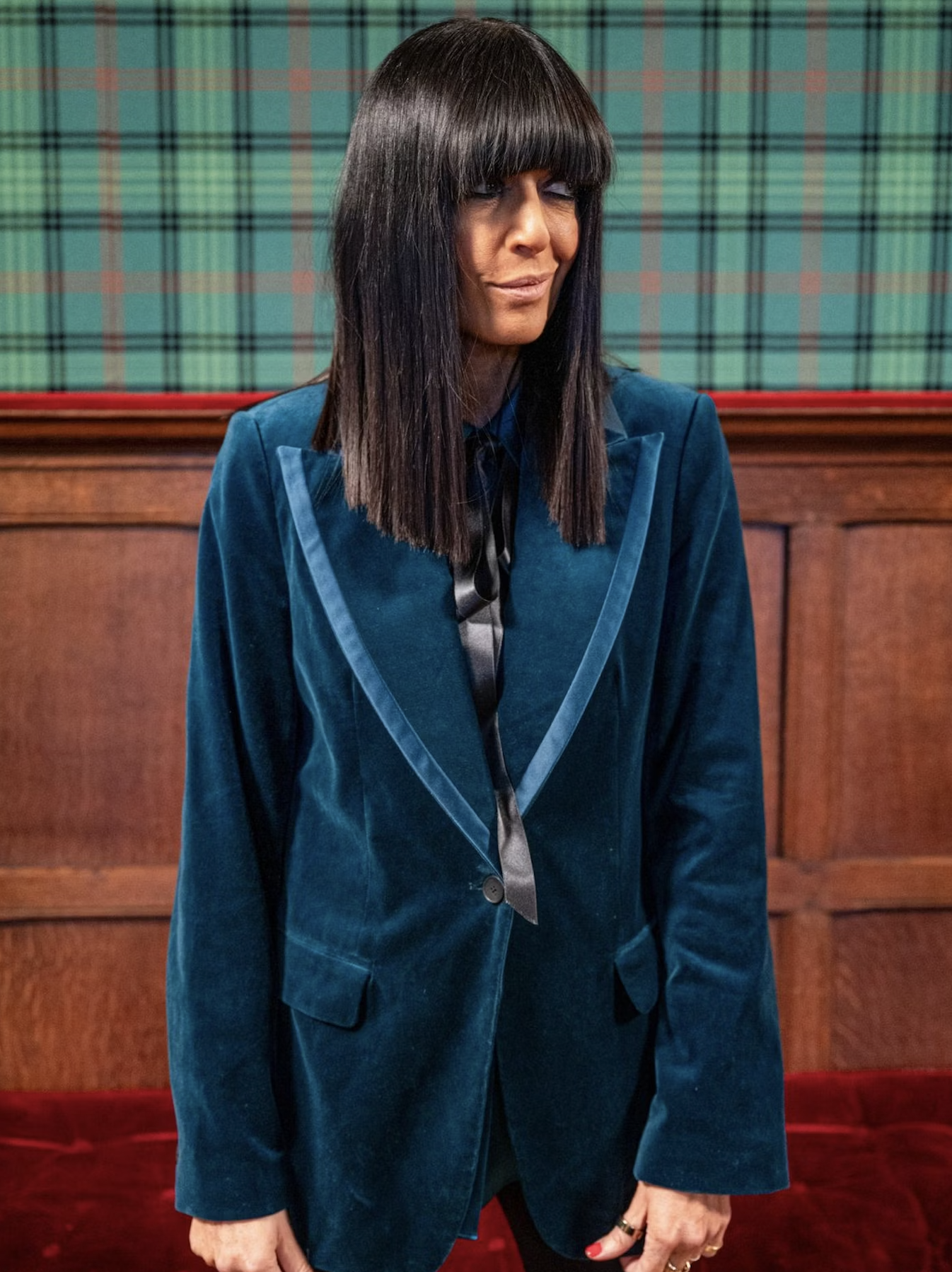 Claudia Winkleman wearing velvet suit.