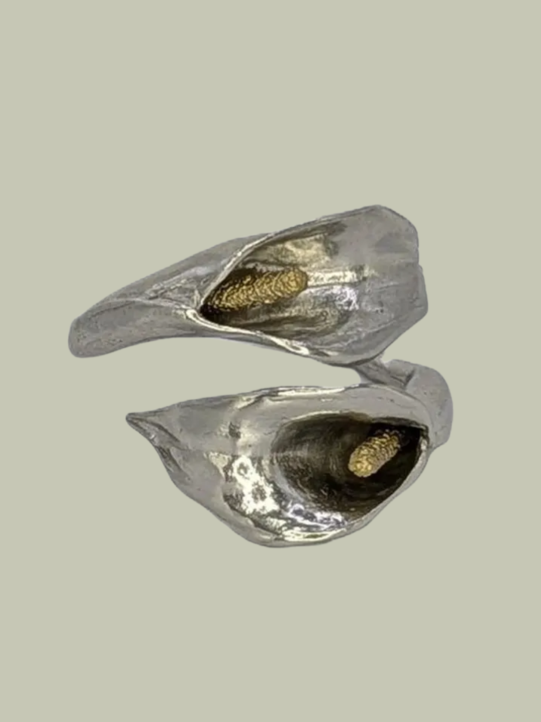 A handcrafted calla lily pewter napkin ring from HugoDeSanchezDesigns on Etsy