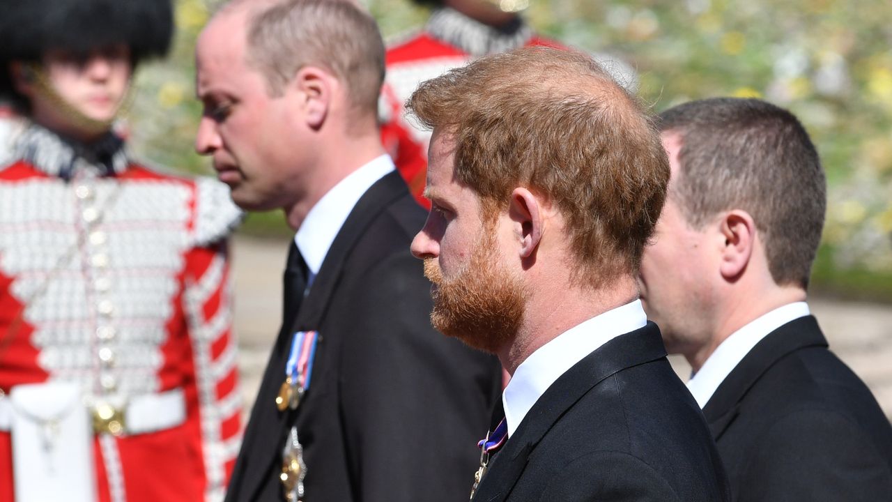 Prince William, Duke of Cambridge; Prince Harry, Duke of Sussex and Peter Phillips walk behind Prince Philip, Duke of Edinburgh&#039;s coffin, carried by a Land rover hearse, in a procession during the funeral of Prince Philip, Duke of Edinburgh at Windsor Castle on April 17, 2021 in Windsor, United Kingdom. Prince Philip of Greece and Denmark was born 10 June 1921, in Greece. He served in the British Royal Navy and fought in WWII. He married the then Princess Elizabeth on 20 November 1947 and was created Duke of Edinburgh, Earl of Merioneth, and Baron Greenwich by King VI. He served as Prince Consort to Queen Elizabeth II until his death on April 9 2021, months short of his 100th birthday. His funeral takes place today at Windsor Castle with only 30 guests invited due to Coronavirus pandemic restrictions