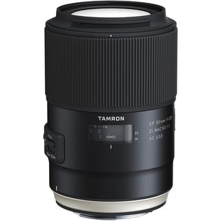 A black Tamron SP 90mm f/2.8 Di Macro USD lens
