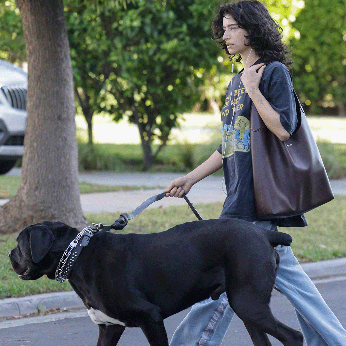 Odessa A&rsquo;zion wearing the Brooklyn 39 Coach bag.