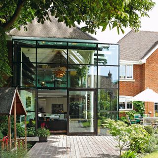 Exterior modernist steel glass extension garden
