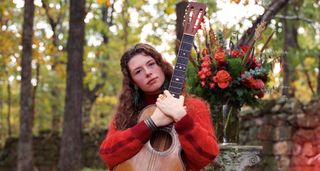 Hannah Wicklund with a 19th century parlour guitar from Fanny&rsquo;s House Of Music in&nbsp;Nashville.