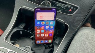 Syncwire Universal Car Phone Holder in a car holding an iPhone
