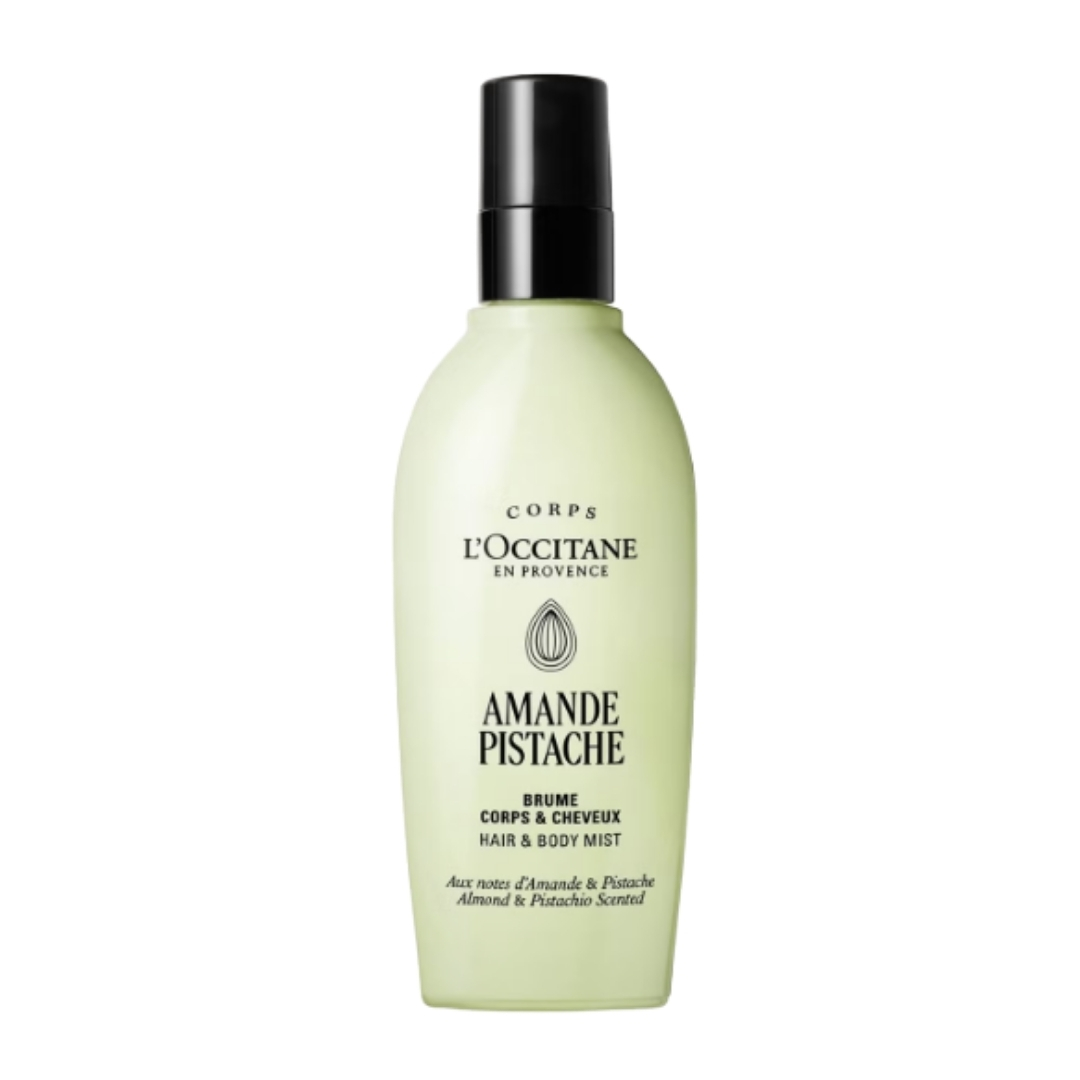 A product shot of the L'Occitane Almond (amande) Pistache Hair &amp;amp; Body Mist, on a white background