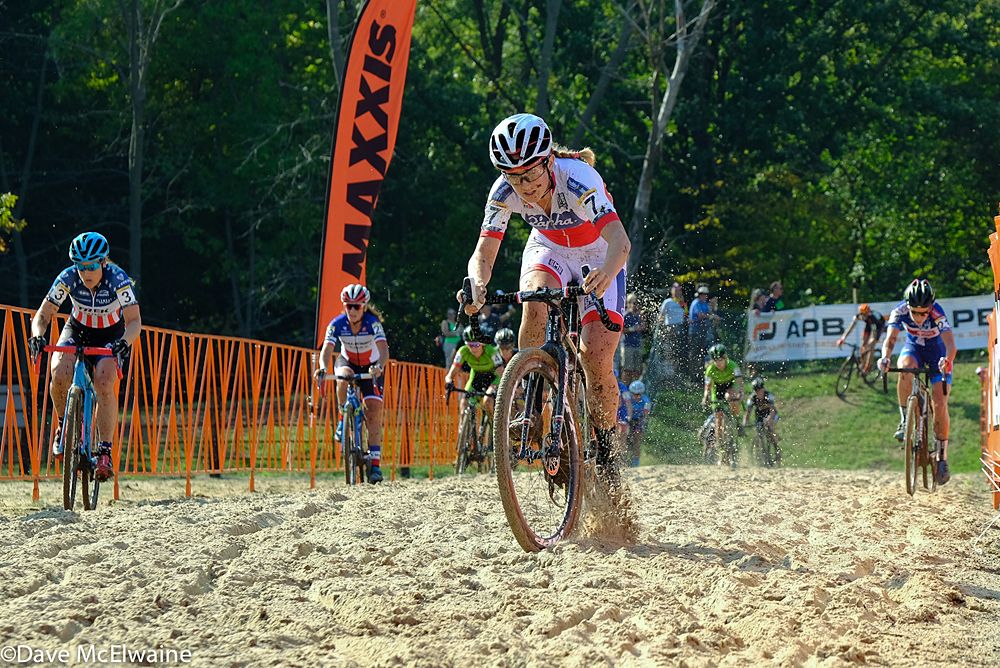UCI U-23 leader Ellen Noble (USA) churning through the sand ahead of Compton on lap one