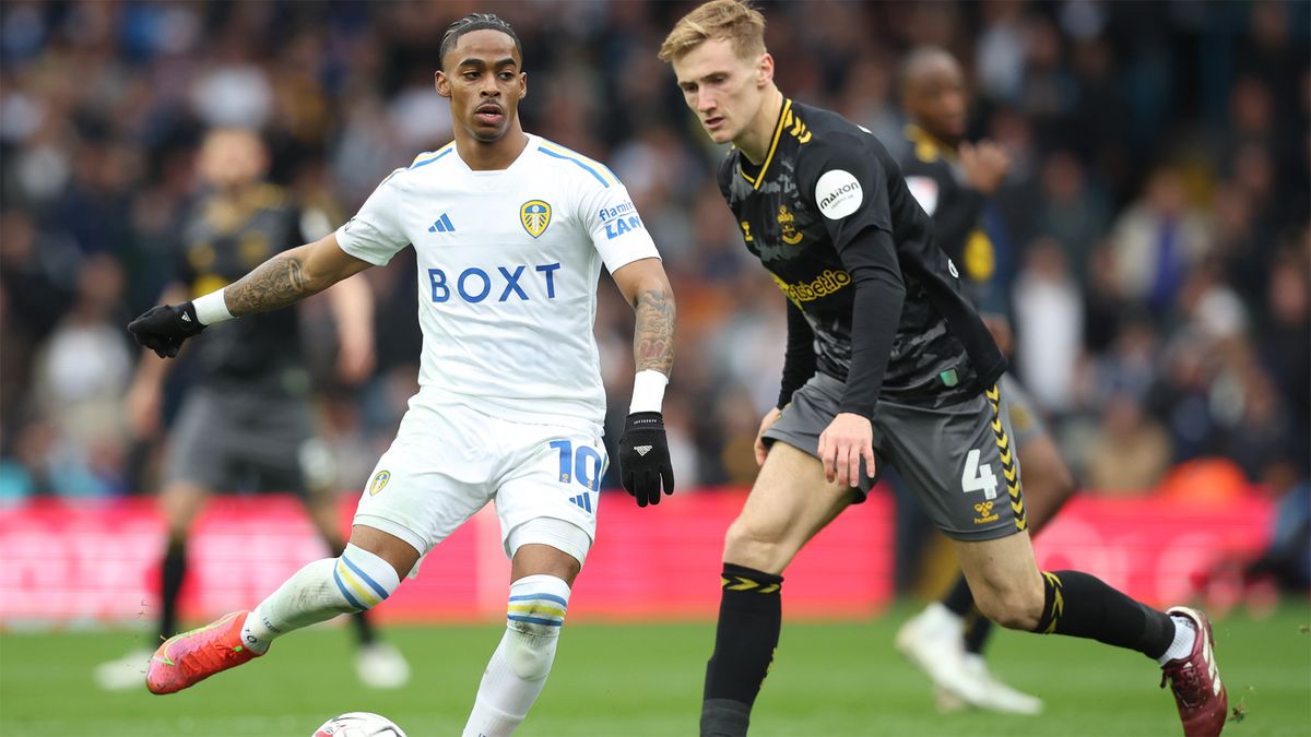 Crysencio Summerville of Leeds United takes on Southampton&#039;s Flynn Downes in a May 2024 EPL encounter.