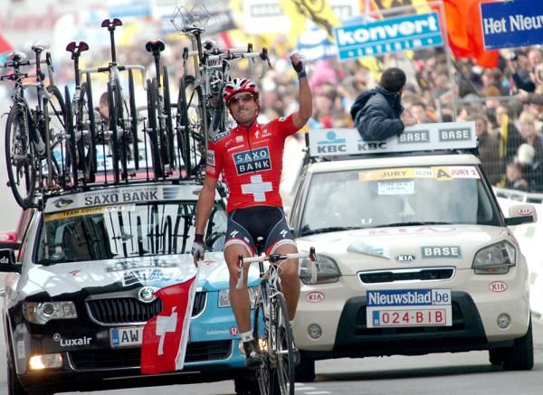 A Swiss flag for the Swiss champion in the finish of Flanders.