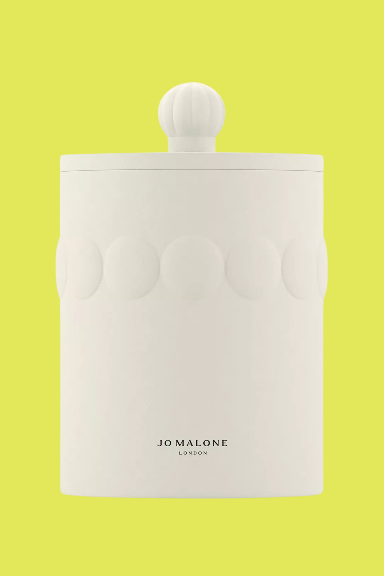 A ceramic candle with a lid