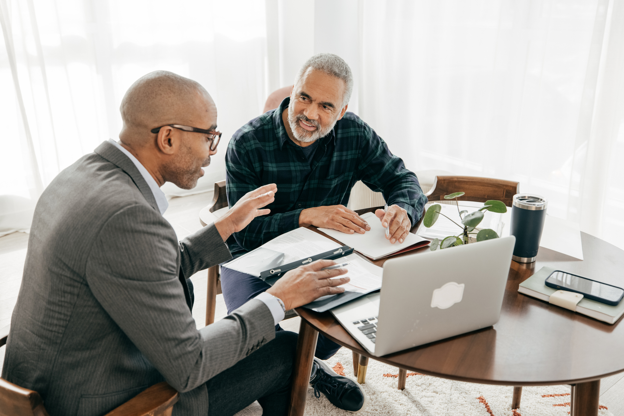 Man with a financial adviser