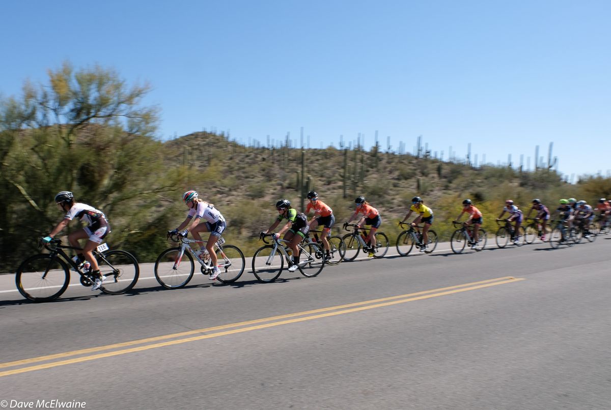 The Pro Women rolling through the Tucson Mountains during lap three