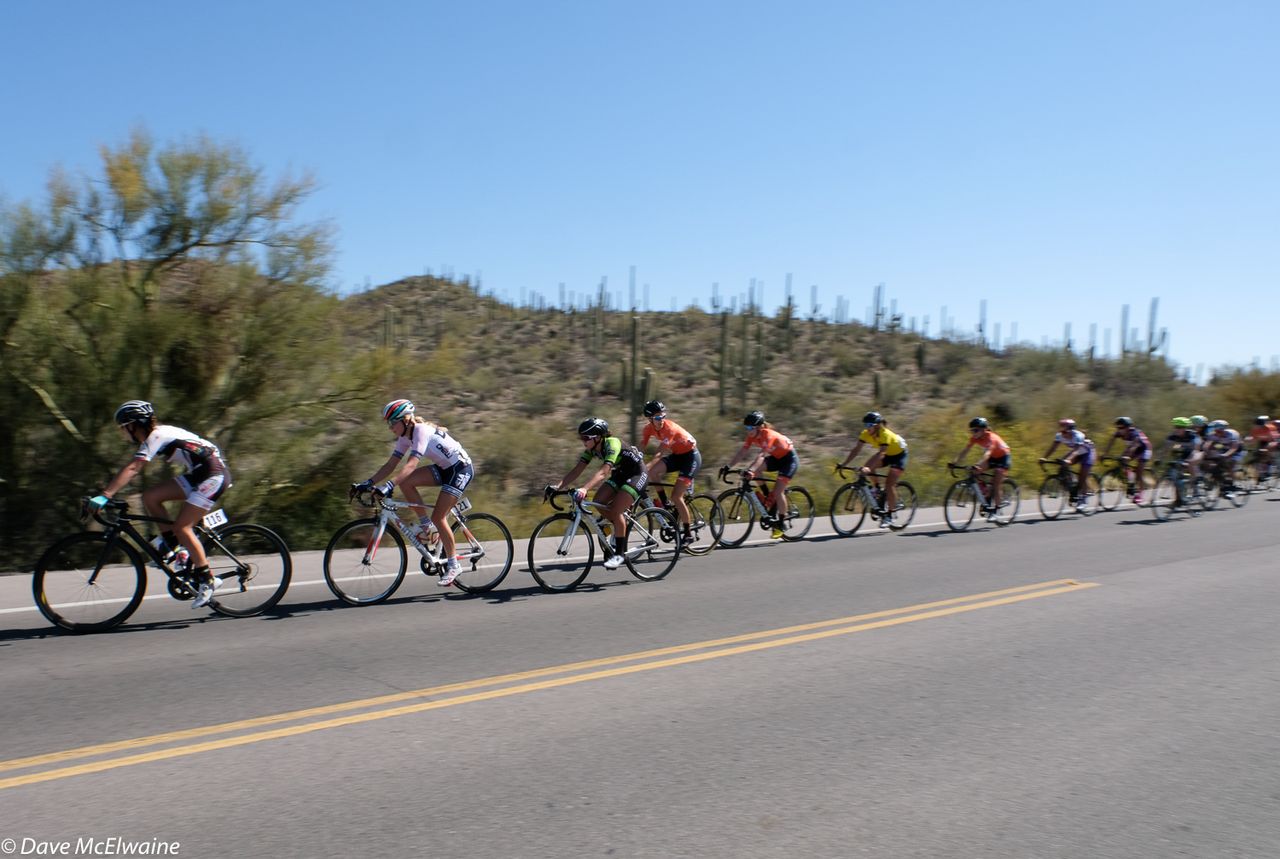 The Pro Women rolling through the Tucson Mountains during lap three
