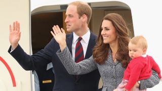 Prince William, Kate Middleton and Prince George leave Fairbairne Airbase