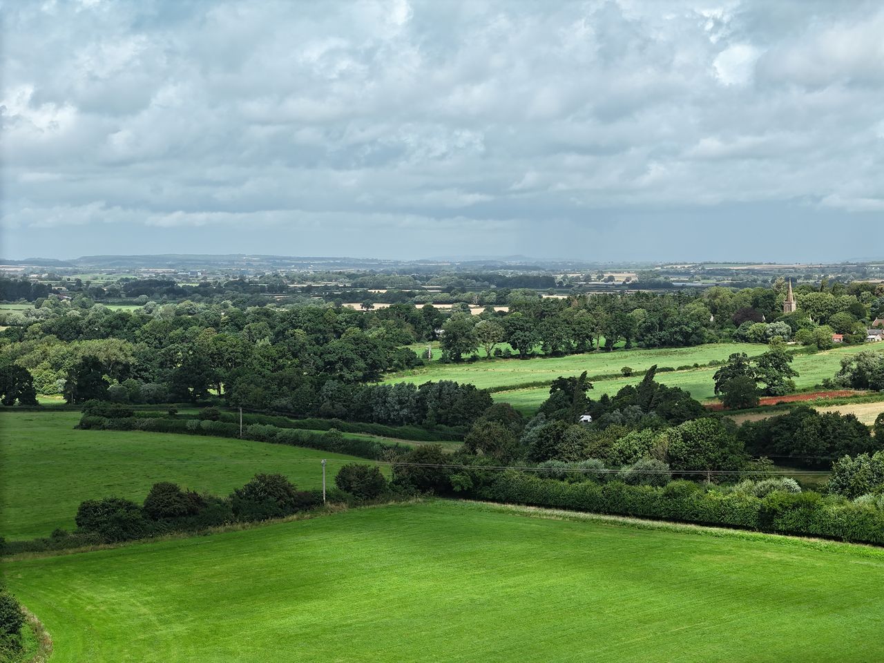DJI Air 3 photo of a field on a sunny day with the 70mm telephoto camera