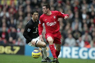 Liverpool's Jamie Carragher under pressure from Manchester United's Cristiano Ronaldo in January 2005.