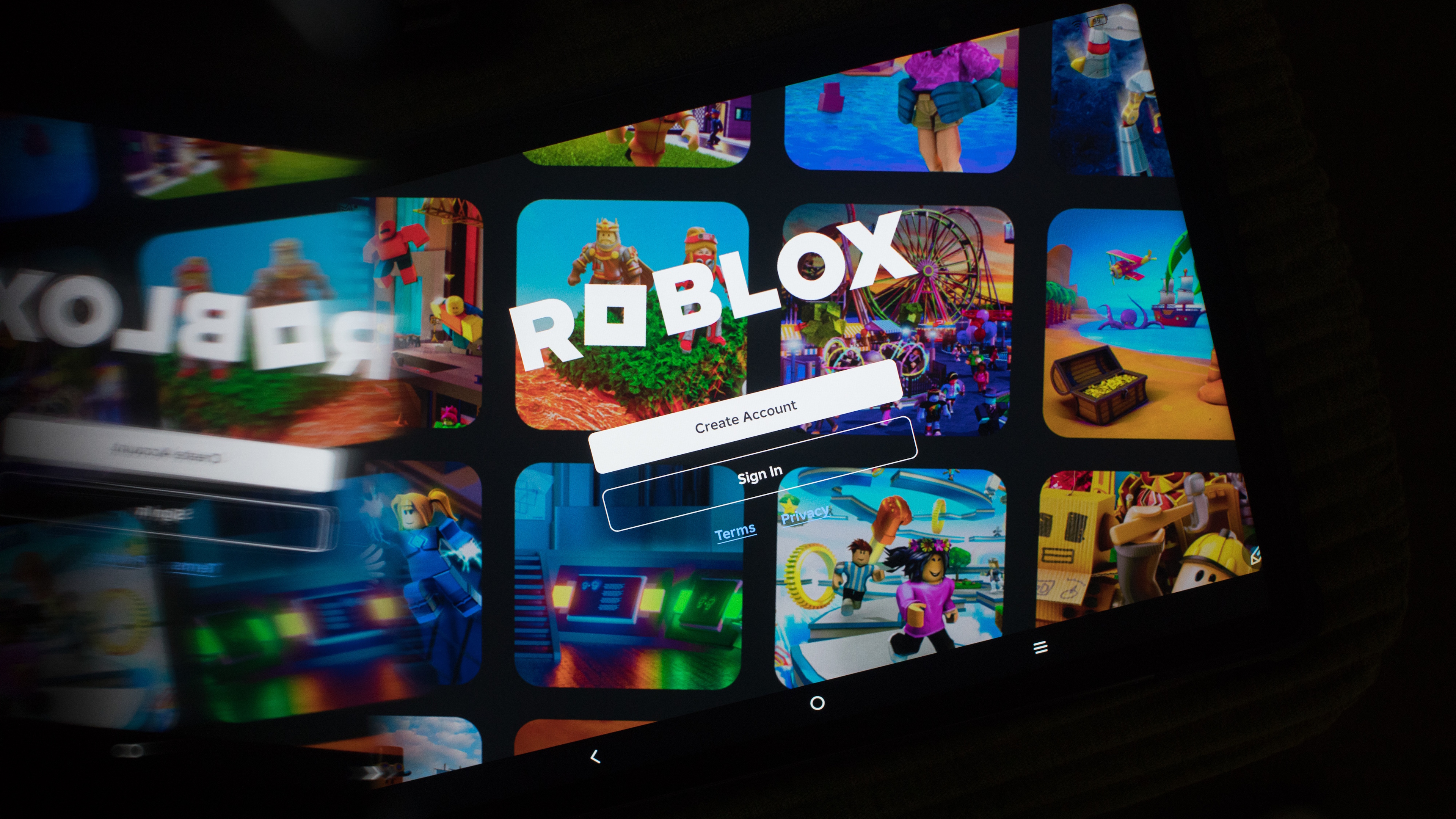 The Roblox app login page displayed on a smartphone arranged in Sydney, Australia, on Wednesday Feb. 11, 2026. Australia's government ramped up pressure on Roblox Corp., summoning executives to explain reports that have alleged children as young as four years old have been sexually groomed on the gaming service. Photographer: Brent Lewin/Bloomberg via Getty Images