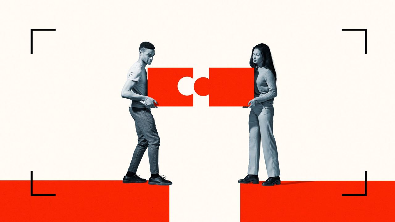 Woman and man slotting puzzle pieces together to represent compromise and how to be happy in a relationship