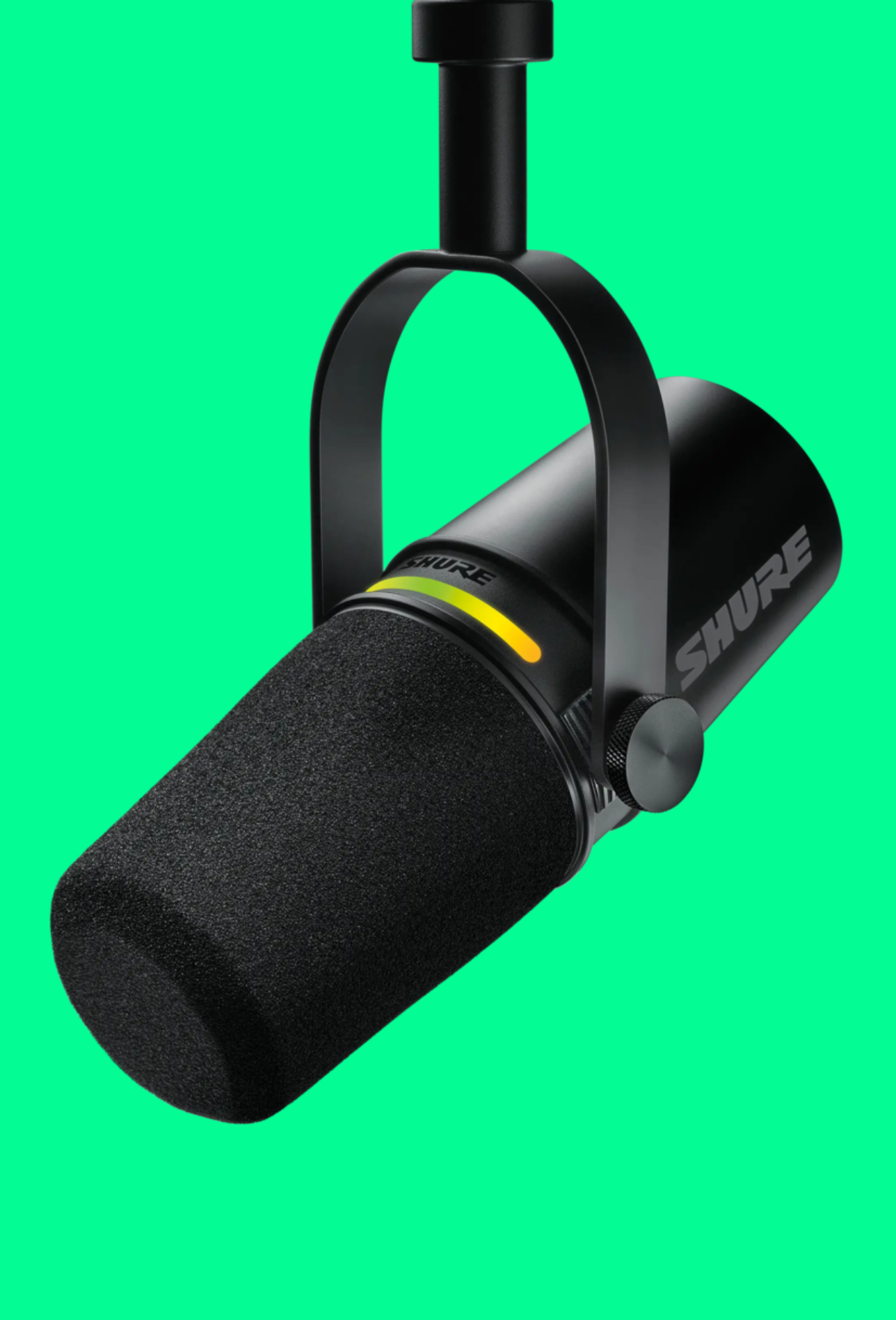 The Shure MV7+ Podcast Microphone on a green background