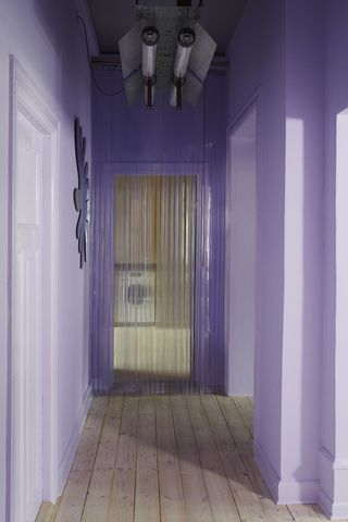 Purple corridor with curtain covering the door at the end