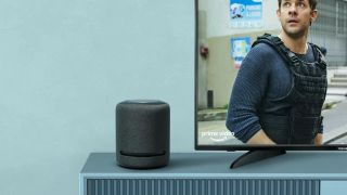 Amazon smart speaker adjacent to TV