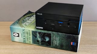 The Asus PN51 MiniPC sat on top of a copy of The Lord of The Rings