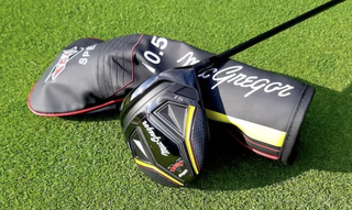 MacGregor V Foil Driver and headcover showing its black, yellow and red design