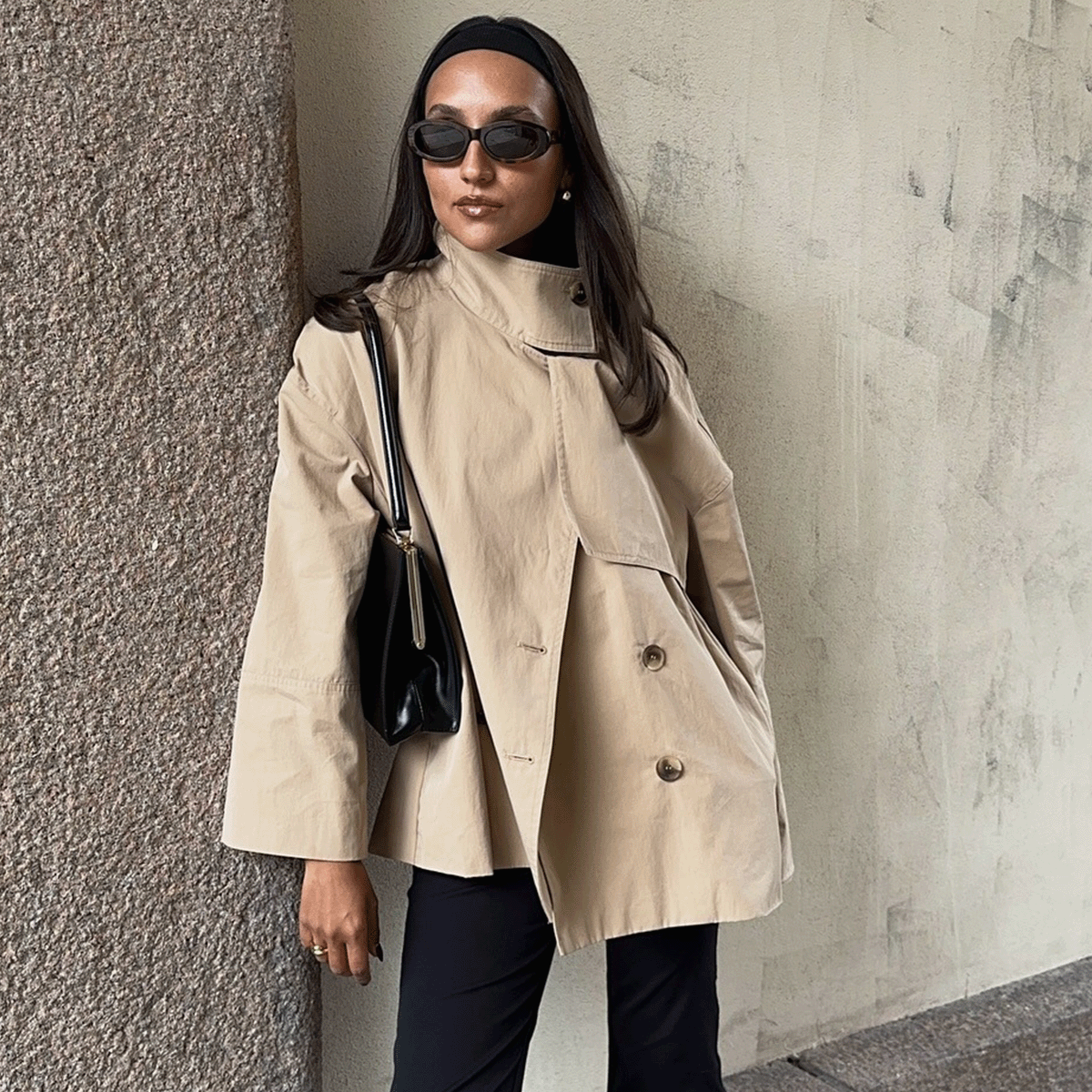 Ingrid Fagerli Edvinsen wearing a trench coat and capris.