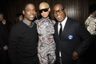 Chris Rock, Amber Rose and Andre Harrell attend THE CINEMA SOCIETY & TARGET host the after party for Roadside Attractions & HBO Films "GOOD HAIR" at The Standard on October 5, 2009 in New York City.
