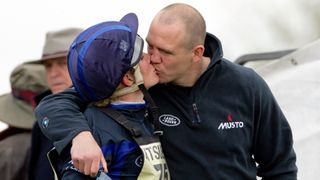 Zara Phillips (L) kisses boyfriend Mike Tindall after completing the cross country phase of the Badminton Horse Trials on May 2, 2010 in Badminton, Gloucestershire.