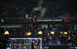 Flares are lit prior to the Group H Europa League match