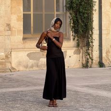 Emmanuelle Koffi in a silk headscarf