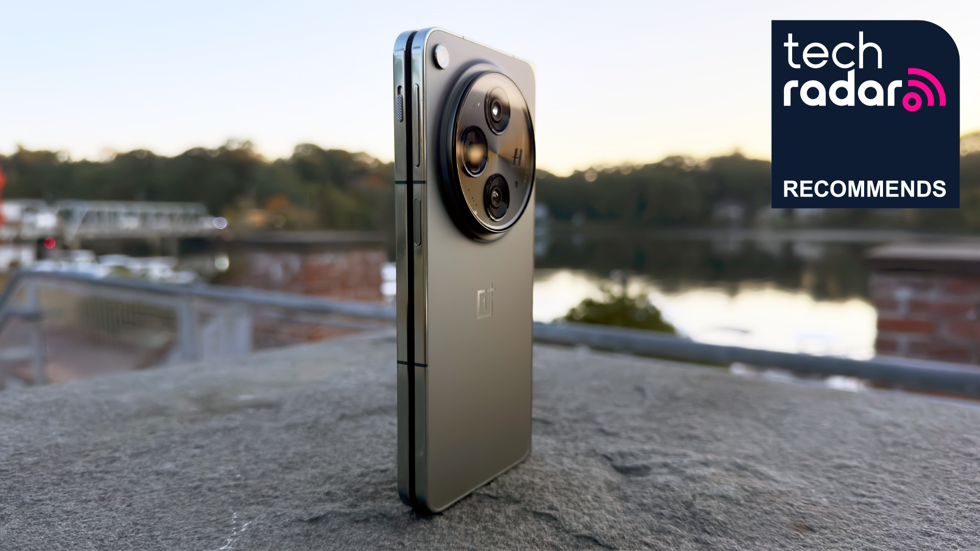 OnePlus Open from back showing cameras with TechRadar recommends badge