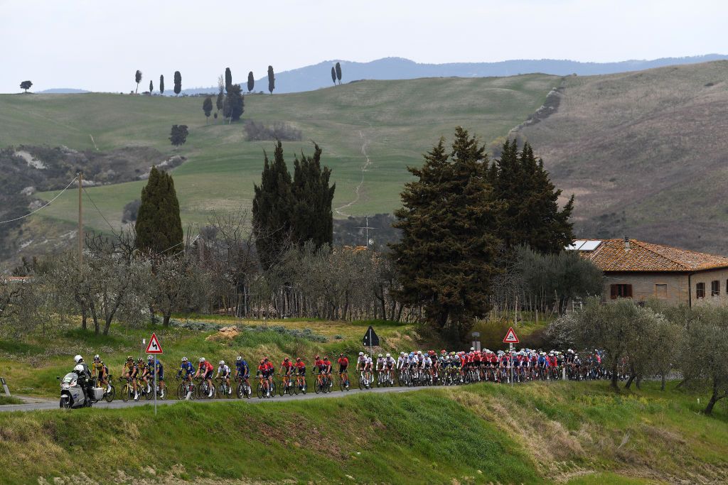CHIUSDINO ITALY MARCH 11 Edoardo Affini of Italy Robert Gesink of Netherlands and Team Jumbo Visma Kasper Asgreen of Denmark Julian Alaphilippe of France and Team Deceuninck QuickStep Mikel Landa Meana of Spain and Team Bahrain Victorious Greg Van Avermaet of Belgium and AG2R Citren Team Lukasz Owsian of Poland and Team Arkea Samsic The Peloton during the 56th TirrenoAdriatico 2021 Stage 2 a 202km stage from Camaiore to Chiusdino 522m Landscape Mountains TirrenoAdriatico on March 11 2021 in Chiusdino Italy Photo by Tim de WaeleGetty Images