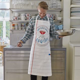 This apron comes with a set of coloured pens, which wash out at 40 degrees