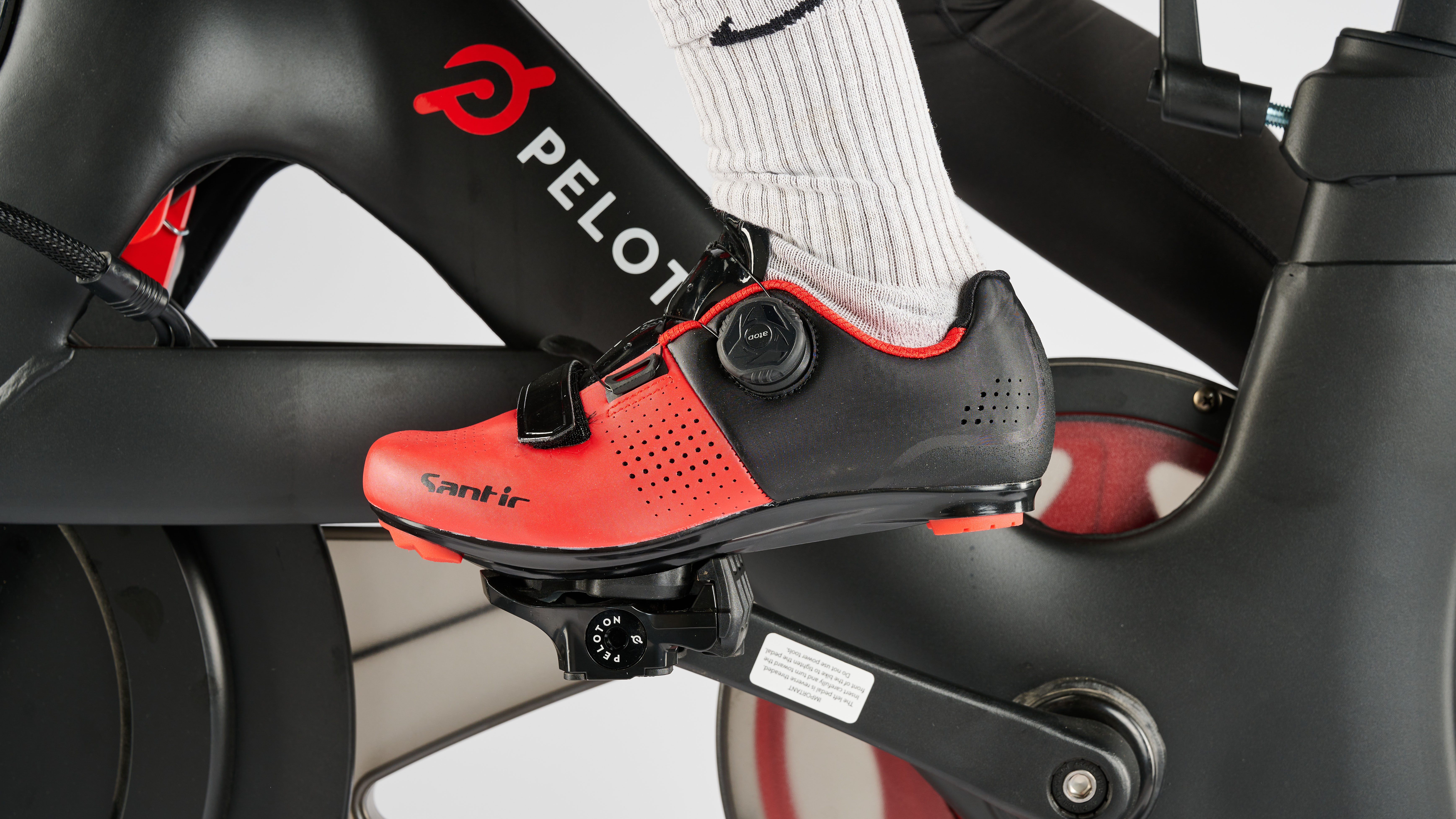 Santic Jian1 cycling shoe being used on Peloton bike