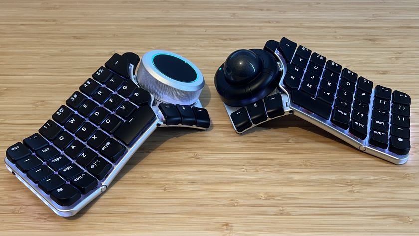 Naya Create split keyboard with different modules installed on a wooden desk