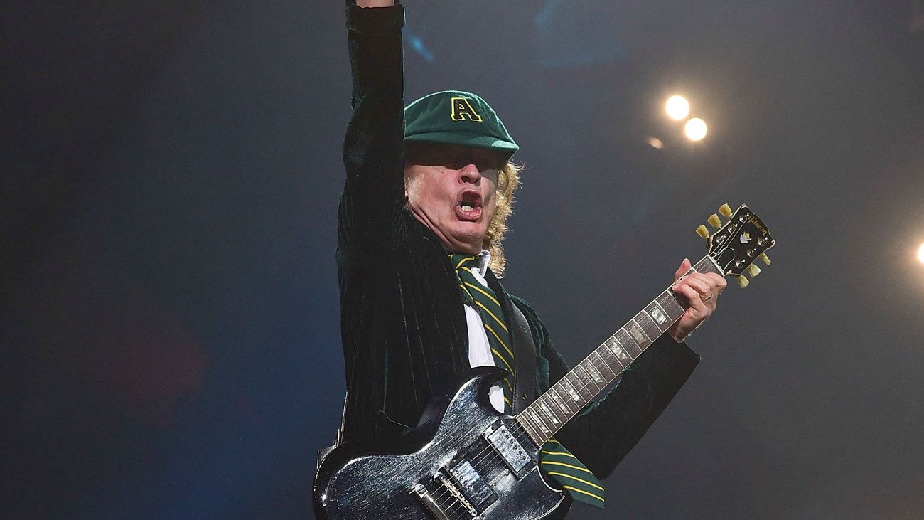 A picture of Angus Young performing live