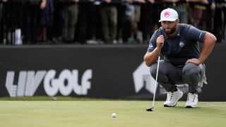 Jon Rahm lines up a putt at LIV Golf Adelaide