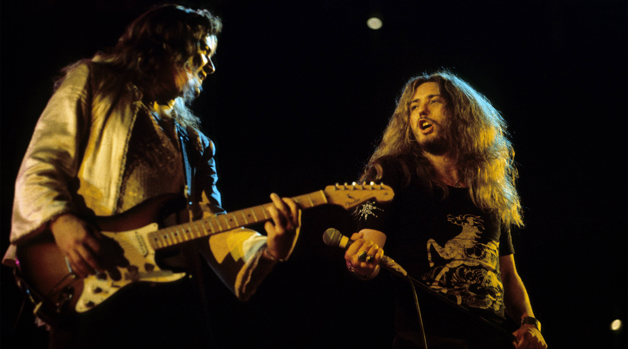 Tommy Bolin (left) and David Coverdale performing live onstage with Deep Purple, December 1975