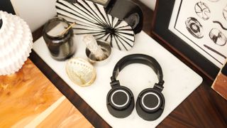 the audio-technica ath-m50xbt2 headphones on a desk