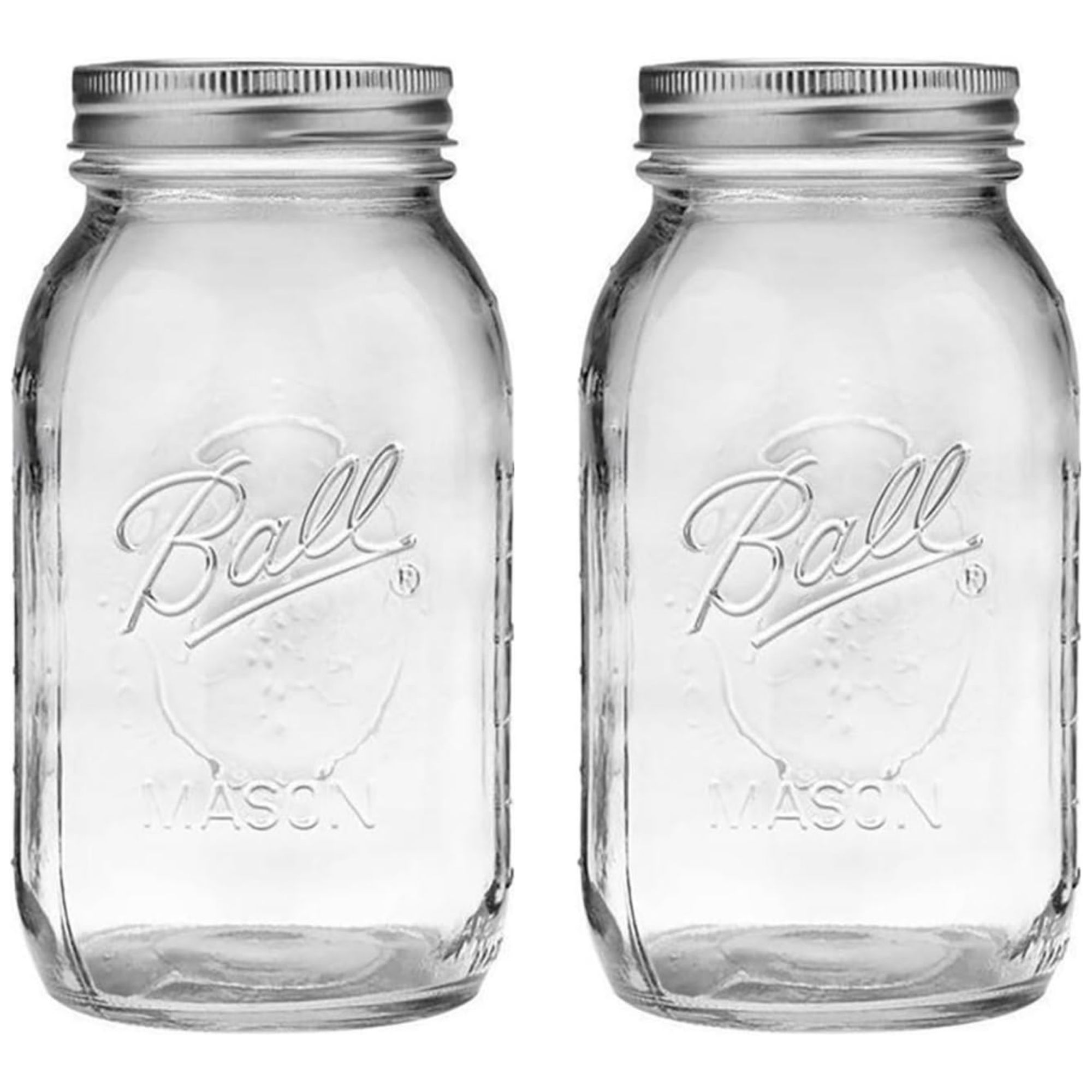 Two glass mason jars with silver lids