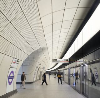 Elizabeth Line interior with sweeping white curved ceiling