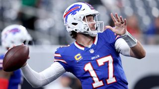 Buffalo Bills quarterback Josh Allen throwing a ball