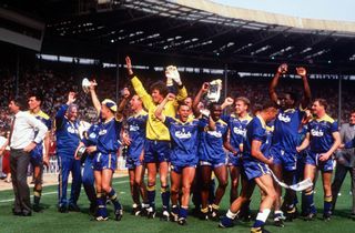 Wimbledon players celebrate their FA Cup final win over Liverpool at Wembley in May 1988.