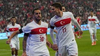 Turkey's Hakan Calhanoglu celebrating with Kenan Yildiz
